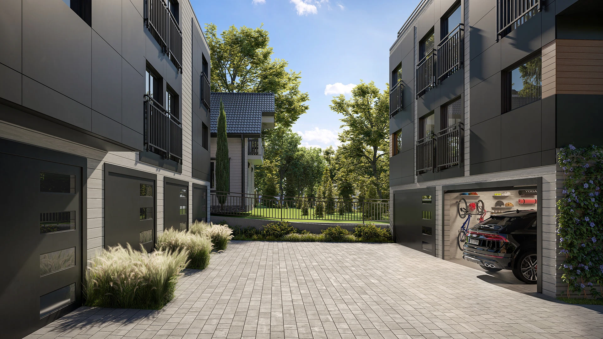 Casas adosadas con diseño moderno, cocheras privadas y jardines frontales.